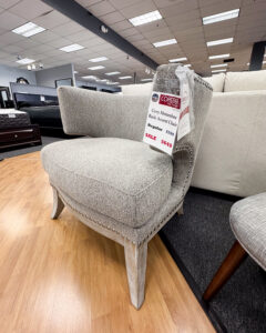 This comfy, chic grey horseshoe accent chair is the perfectly functional stylish touch to any room!