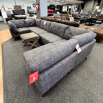 Upgrade your couch before the family crashes your house with this gorgeous grey lounger couch and greige footstool!