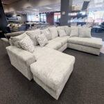 This velvety soft couch and throw pillows are as comfy as they are inviting.