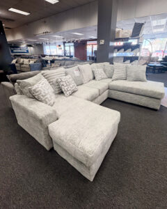 This velvety soft couch and throw pillows are as comfy as they are inviting.