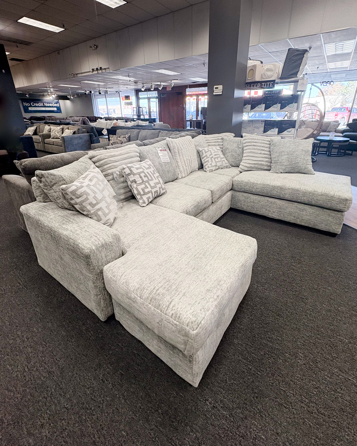 This velvety soft couch and throw pillows are as comfy as they are inviting.